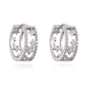 Minimalist silver-plated star hoop earrings with zircon pavé on a white background