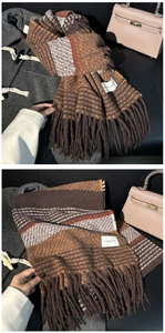 Close-up of knit checkered scarf in brown and orange with tassel details and fashion label