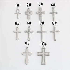 Detailed collection of ten stainless steel cross pendants with various religious designs