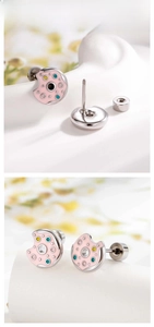Detailed view of pink donut stud earring with colorful zircon and screw back closure