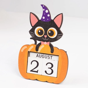 Detail of wooden Halloween countdown calendar featuring a black cat and pumpkin desktop decor