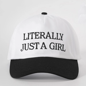 Detail of embroidered Literally Just a Girl text on a black and white baseball cap