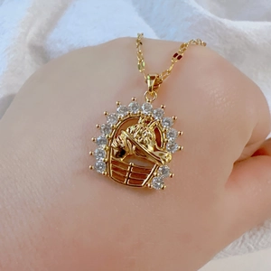 Exquisite gold round horse head pendant with micro-paved sparkling white zircon stones