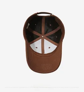 Detail of the brown baseball cap interior showing reinforced lining and stitching