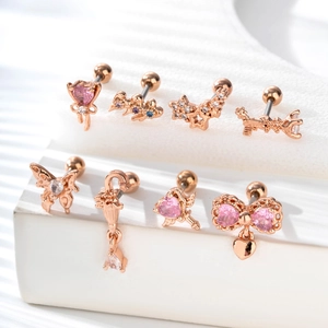Rose gold heart and butterfly bow cartilage studs set with pink cubic zirconia