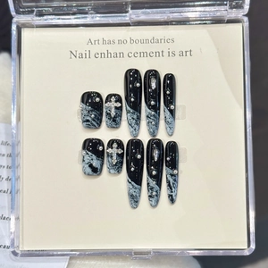 Gothic black marble press-on nails with silver cross and rhinestone accents