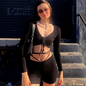 Women's black long sleeve drawstring crop top and high waist slim yoga shorts set
