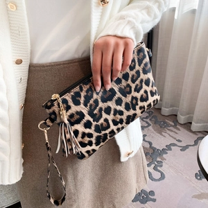 Stylish leopard print envelope clutch with fringe tassel and wristlet strap for women