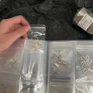Transparent PVC jewelry storage book for earrings and rings with anti-oxidation seal bags