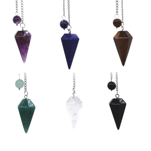 Set of six natural crystal hexagonal prism pendants with metal chains on a white background