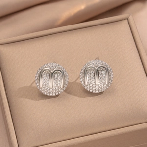 Elegant 18K gold-plated M-letter stud earrings with sparkling cubic zirconia inlay