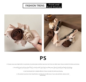 Detail of handmade satin rose banana clips with pearls in beige and brown colors