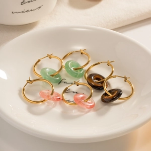 Retro gold hoop earrings with green, pink, and brown donut-shaped gemstone pendants
