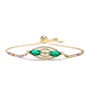 Golden adjustable bracelet with zircon evil eye and colorful crystal accents