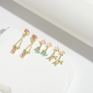 Exquisite gold-plated teddy bear earrings with star and heart zircon stones on white stone
