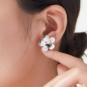 Silver five-petal flower stud earrings in titanium steel with a high-polished finish