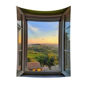 Detail view of wall tapestry showing a fake window with European countryside landscape