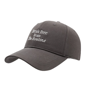 Dark grey cotton baseball cap with Break Free From The Routine white embroidery