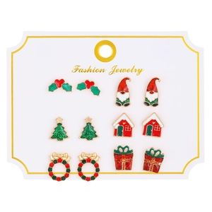 Detailed set of 6 pairs of festive Christmas stud earrings on a fashion jewelry display card