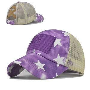 Purple washed cotton baseball cap with star pattern and messy bun ponytail criss-cross back