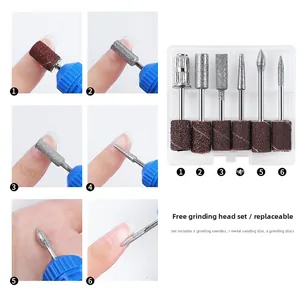 Detail view of 6 manicure drill bits and sanding bands for professional nail shaping and care