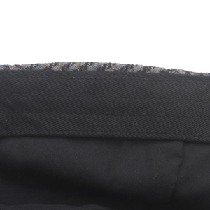 Classic houndstooth wool tweed flat cap with a durable black cotton sweatband detail