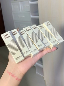 Detailed set of six matte liquid eyeshadow tubes in elegant beige boxes for makeup