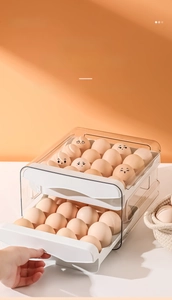 Hand pulling drawer of double-layer transparent egg storage box with grid dividers