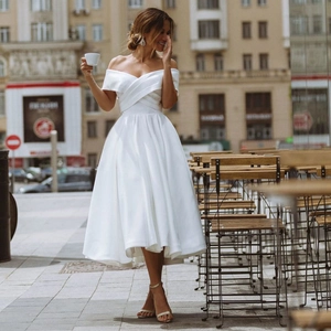 Elegant white satin off-shoulder midi dress with a flared skirt for formal weddings