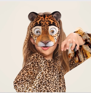 Detail of child wearing a leopard animal mask and matching costume for Halloween party