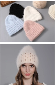 Detailed view of knitted rabbit fur winter hats with rhinestones in multiple colors