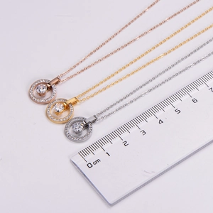Three-color nested ring necklaces with zircon details and a measuring ruler for size comparison