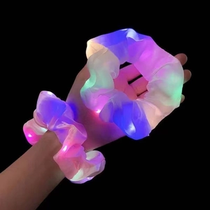 Set of two glowing LED hair scrunchies in translucent rainbow mesh fabric
