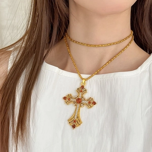 Collier vintage doré avec pendentif croix, cristaux ambrés et chaîne tressée