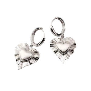Silver metallic heart earrings with textured fold design shown on a clean white background