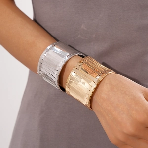 Minimalist metallic geometric open cuff bracelets in polished gold and silver woven texture
