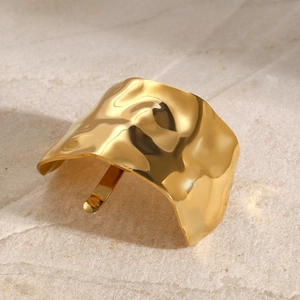 Golden fluid style hair pin with irregular lava texture for elegant ponytails