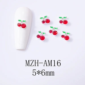 Detailed view of red cherry nail art charms sized 5x6mm with silver alloy base