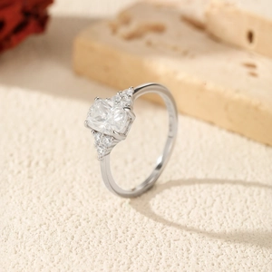 Elegant S925 sterling silver ring featuring a 1 carat moissanite center stone in silver