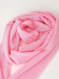 Detailed close-up of pink breathable mesh fabric texture and sheer ribbon detail