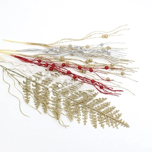 Christmas tree decoration picks with gold ferns, red berries and festive branch sprays