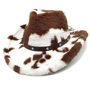 Detail of cow print faux fur cowboy hat with turquoise studded brown leather band