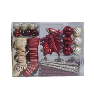 Festive red and gold Christmas ornament set with glitter balls, stockings and icicles