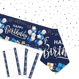 Detail of navy blue happy birthday banner and napkins with silver star and balloon patterns