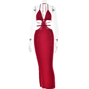 Detail of red knitted halter dress featuring waist cut-out and backless slim fit