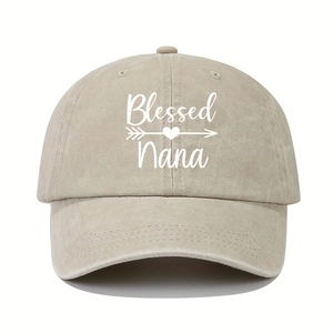 Khaki washed baseball cap featuring white Blessed Nana embroidery and heart detail