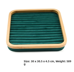 Detailed top view of 30cm bamboo jewelry tray with dark green velvet 12-slot ring display