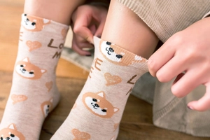 Detail of soft cotton crew socks with Shiba Inu cartoon print and LOVE ME elastic cuff