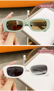 Détail de lunettes de soleil rectangulaires rétro en monture vert menthe et blanc
