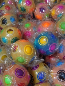 Bulk lot of 12-hole puzzle rainbow magic balls in transparent plastic bags